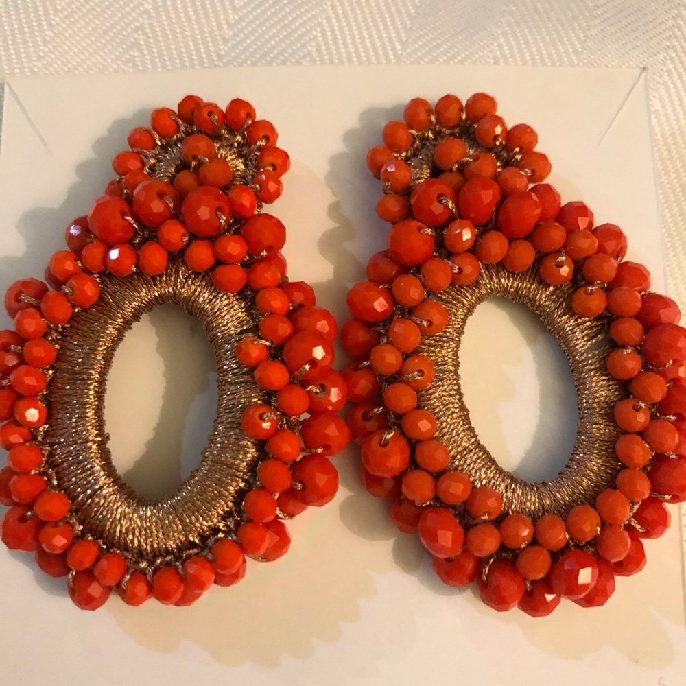 Handmade orange and gold drop earrings.